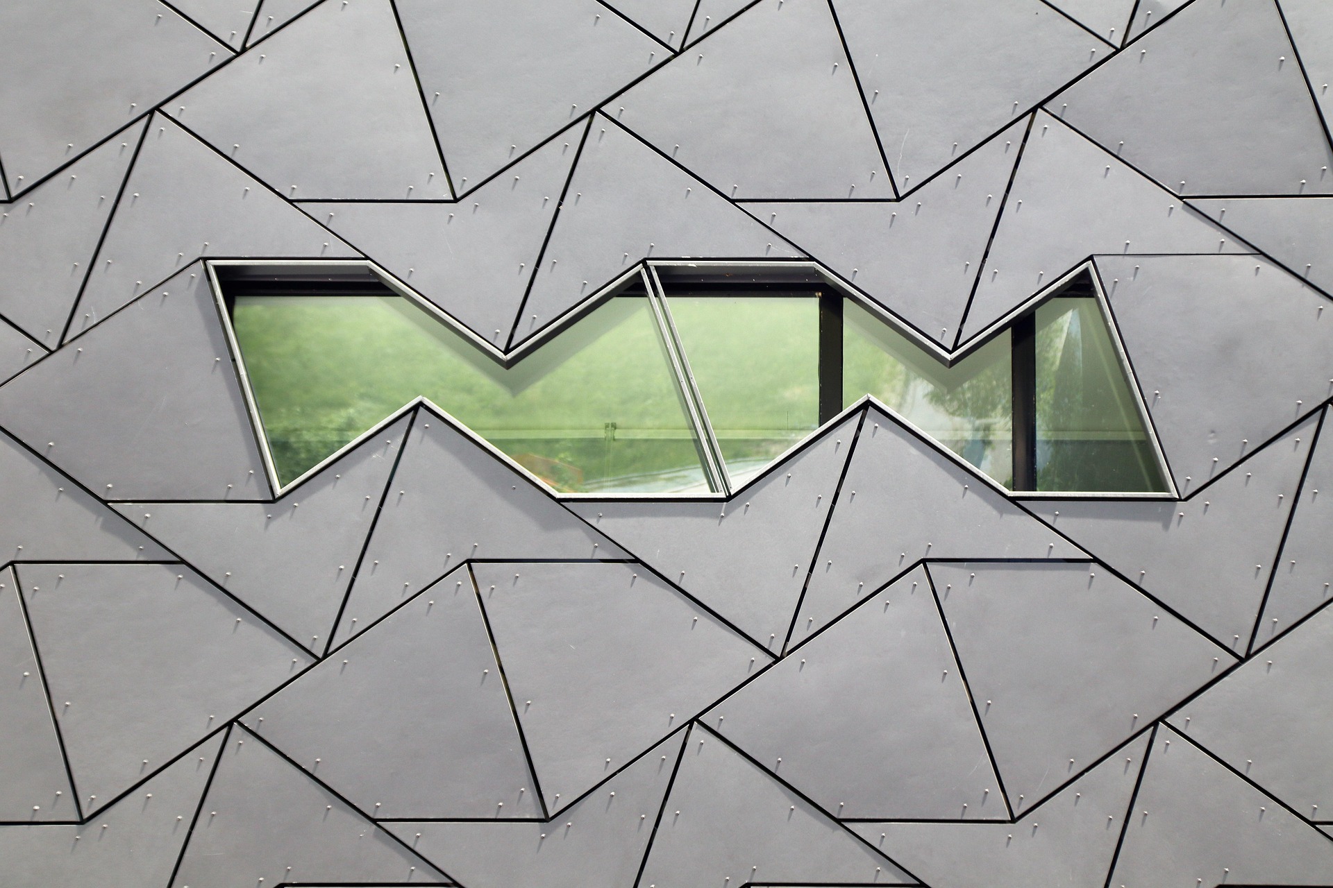 metal facade of a building, composed of polygons